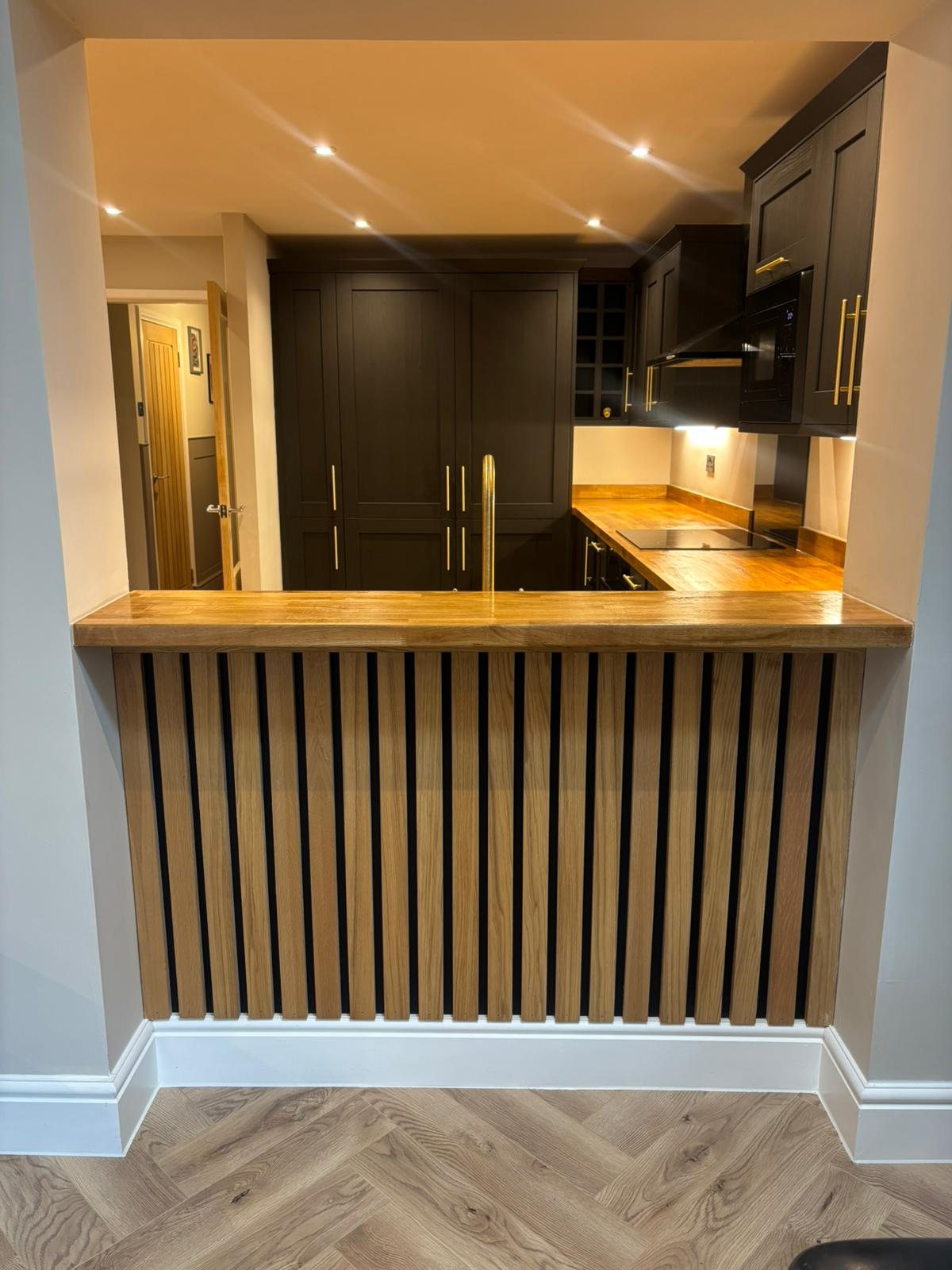Commercial bar and reception fit-out in dark timber slats