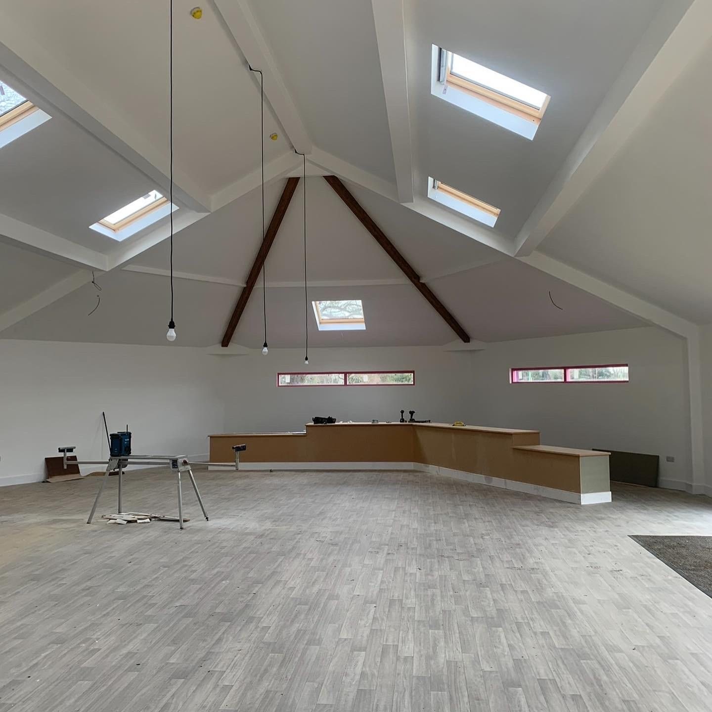 Loft conversion with a vaulted ceiling and Velux rooflights